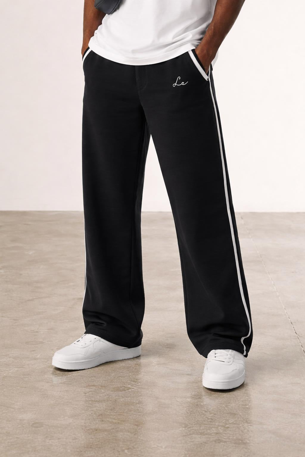 Close-up of the model's lower body wearing The Lounge Rest Trousers